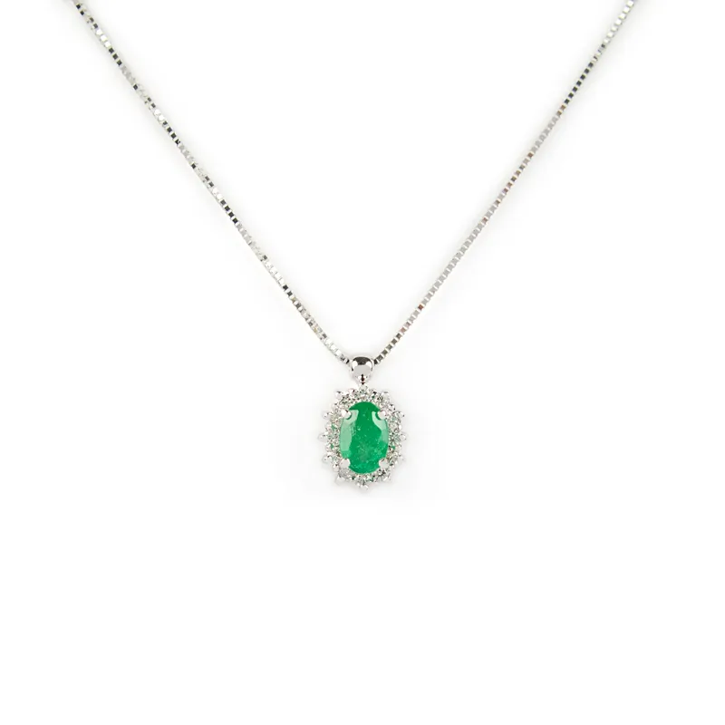 Collana in oro bianco con smeraldo ovale e diamanti